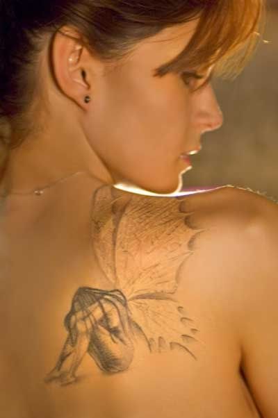 tribal_tattoos.jpg,womens_tattoo.jpg