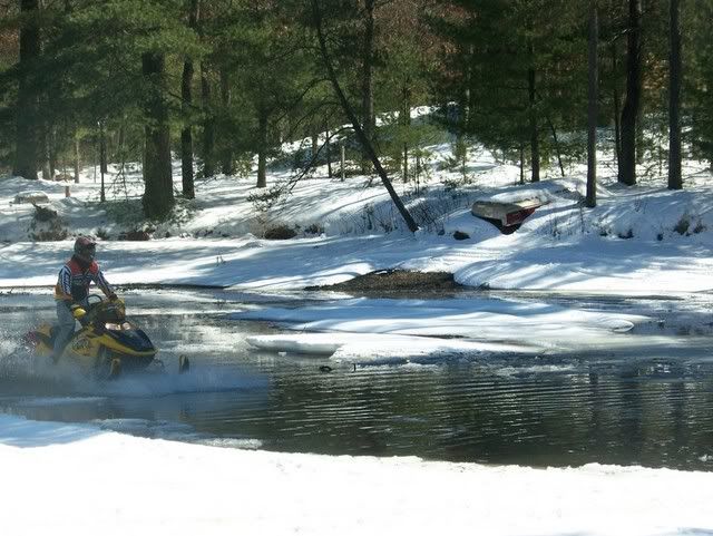 Snowmobiles Mudding