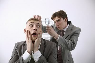 6546321-man-examining-his-friend-s-hair-with-magnifying-glass.jpg