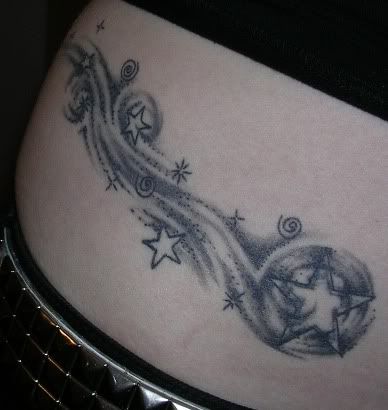 swirly tattoo. swirly tattoos